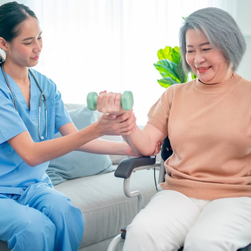 asian-nurse-or-doctor-who-work-as-homecare-support-staff-help-senior-woman-exercise.jpg